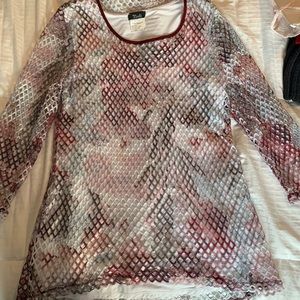 A long sleeve Bali shirt with attached camisole underneath